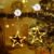 Qedertek LED Stars Christmas Lighting, 10 LED Light Curtain, Warm White, Battery Operated, Suction Cups, Timer, Window Fairy Lights Indoor, Christmas Decoration, Balcony, Party, Wedding (Pack of 2)
